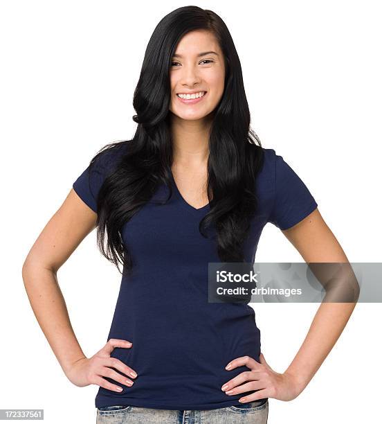 Foto de Mulher Jovem Feliz Com As Mãos Nos Quadris e mais fotos de stock de Mulheres - Mulheres, Camiseta, Azul