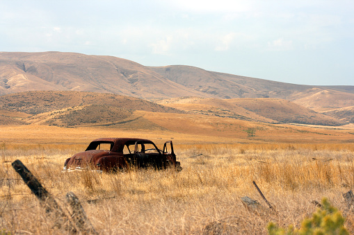 Vintage car lies witness to fields of central Washington, near Yakima.  Look at more 