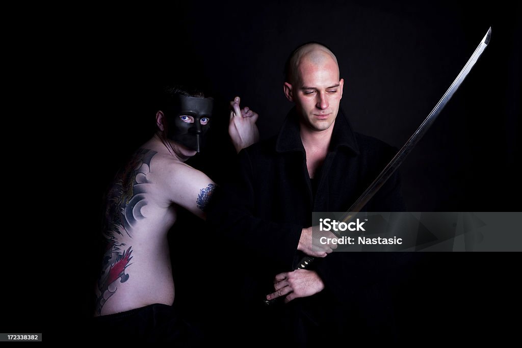 evil and good Evil spirit chanting around warrior with katana sword Yakuza Stock Photo