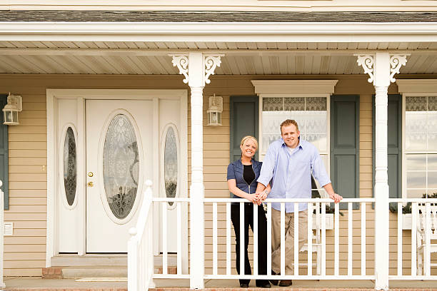 istock Young Couple Standing on Porch II 172338586