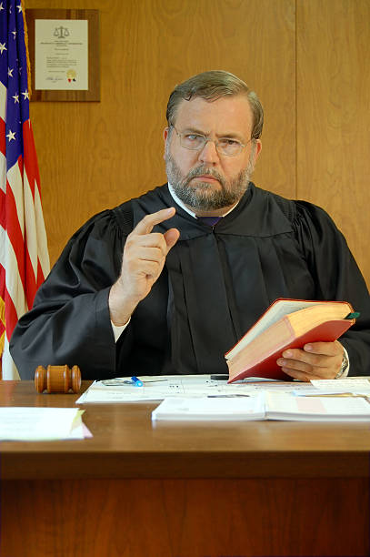 istock Judge Throws The Book At You 172338600
