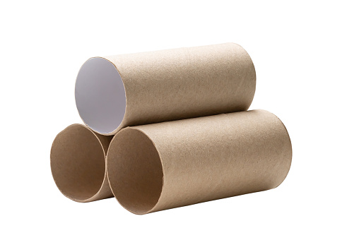 Short tissue paper cores in stack are isolated on white background with clipping path.