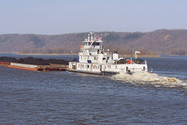 Tug Boat and Coal stock photo