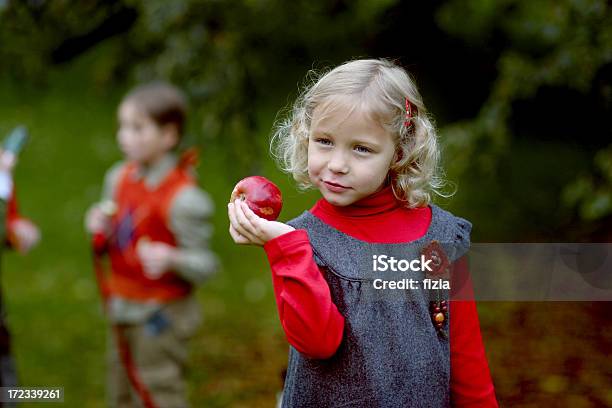 Girl With An Apple Stock Photo - Download Image Now - Apple - Fruit, Autumn, Beauty