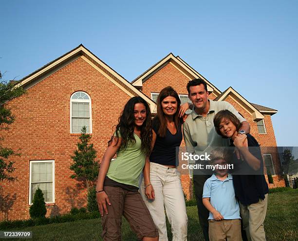Family In Front Of House Stock Photo - Download Image Now - In Front Of, New, People