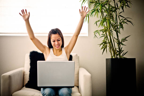 istock cheerful female with laptop 172339723