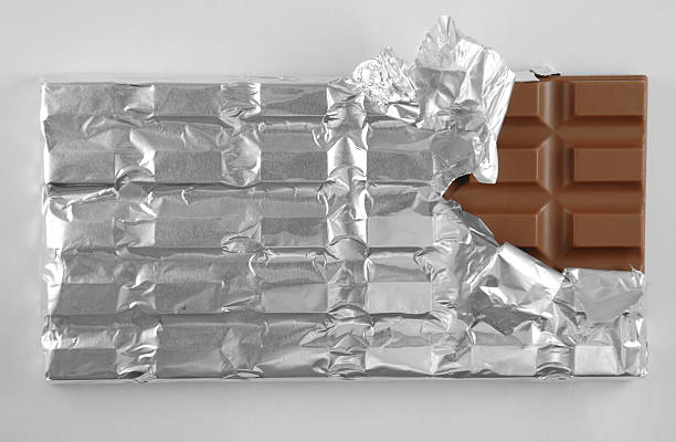 istock Partially Unwrapped Bar of Chocolate 172339861