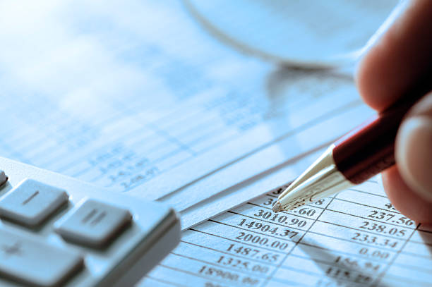 istock Close up of hand calculating financial figures 172340036