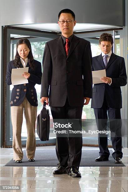 Foto de Empresário Series e mais fotos de stock de Entrar - Entrar, Trabalho de Equipe, 35-39 Anos