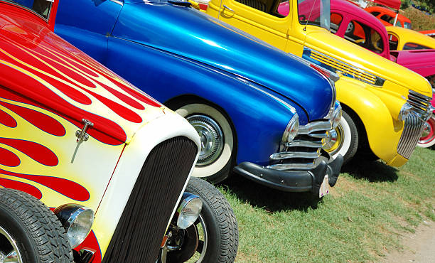 Line of hotrod cars in grass at car show Please see my Hot Rod lightbox banner link below -- Thanks! car show photos stock pictures, royalty-free photos & images