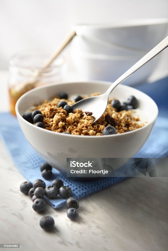 Desayuno imágenes fijas: Cereales y arándanos - Foto de stock de Cereal de desayuno libre de derechos