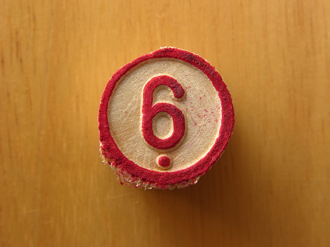 Cheap bingo wood number showing number 6