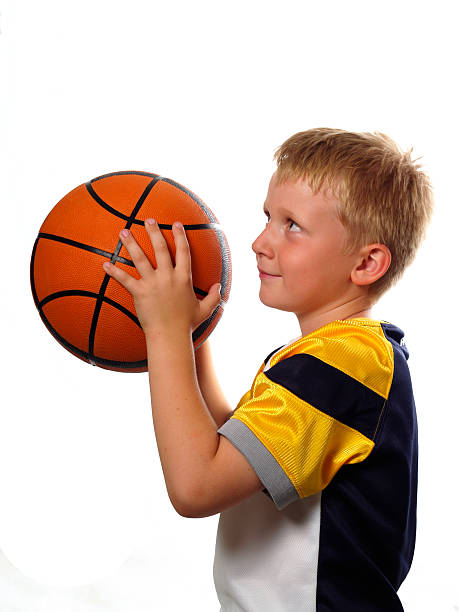 istock basketball player, little boy, isolated on white background 172342596