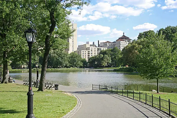 "Pedestrian footpath by lake, Central Park North, New York City, NY, USA."