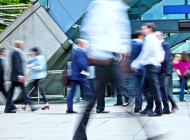 istock blurred business people walking 172343319