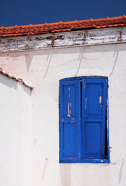 istock View of a white greek house 172344176