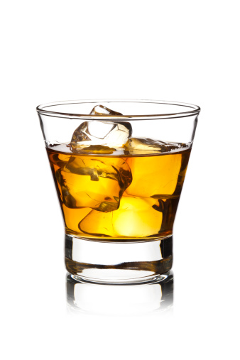 Whisky with Ice Cubes Isolated on White Background.