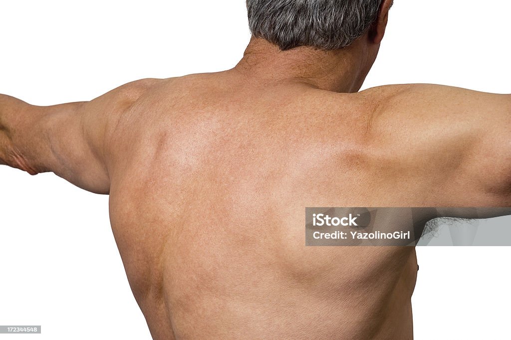 Senior Athlete - Upper Back (clipping path) "70 yr old senior male, athlete,  showing back of upper torso, stretching arms out.Model: Paul Yazolino is 70 and still very active in the world of competitive cycling.  He holds the 1979 Mr. USA bodybuilding title in the masters division." Rear View Stock Photo