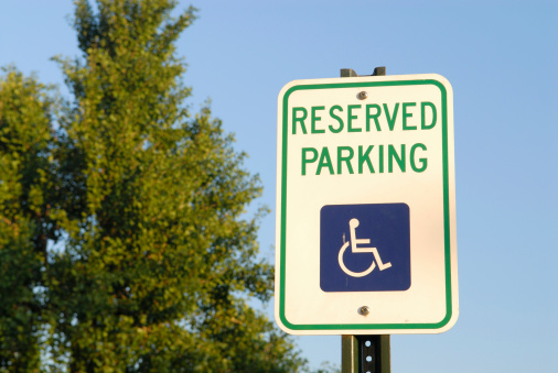 Reserved Parking Sign with tree background