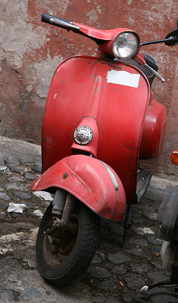 istock Grungy red scooter in Rome 172345009