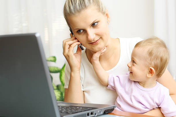 istock Busy mother with her baby 172345496