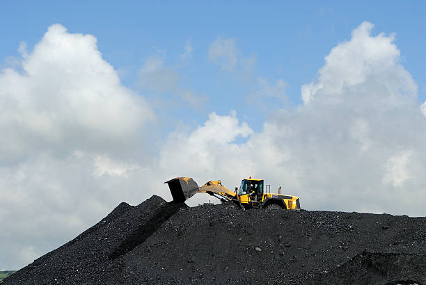 making heaps digger moves coal coal mine photos stock pictures, royalty-free photos & images