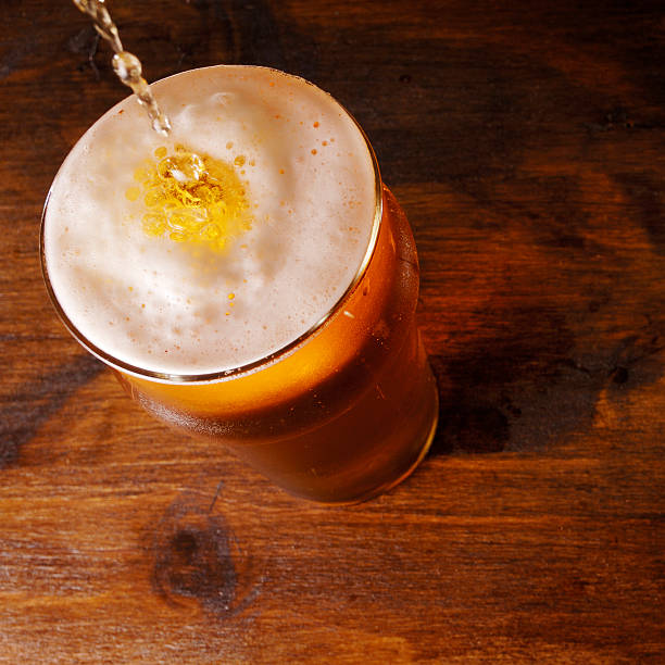 istock Lager pouring into pint glass 172346565