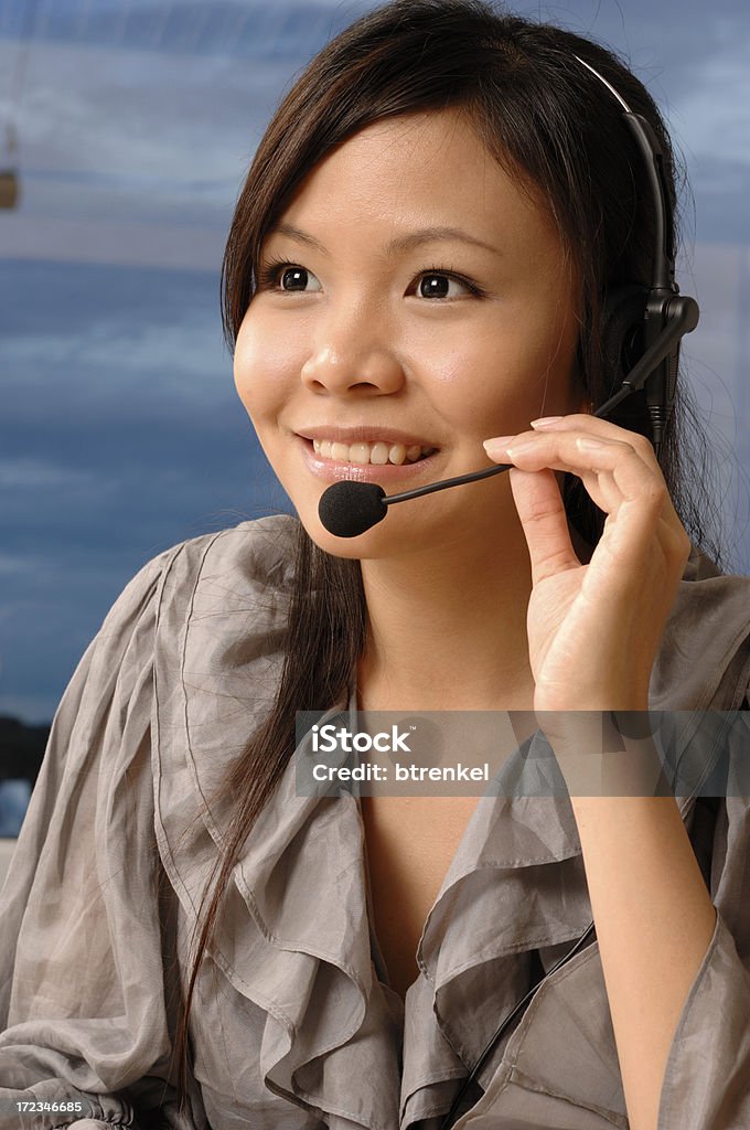 Serviço com um sorriso de modelo asiático - Foto de stock de Adulto royalty-free