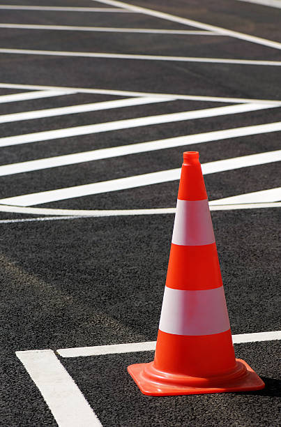 istock Traffic cone sitting on the street 172347407