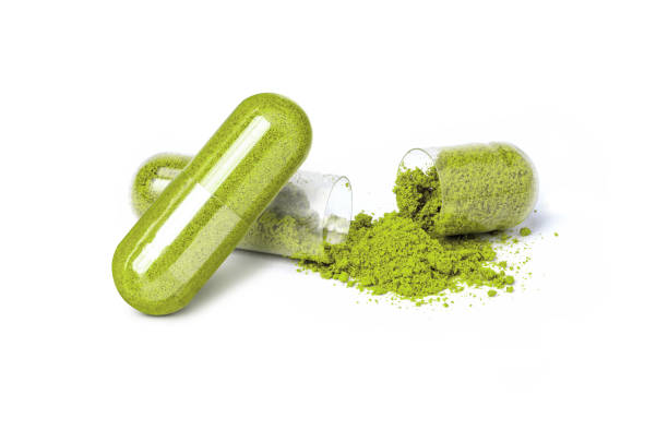 istock Green herbal powder capsule 1723478906