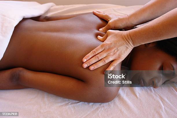 Young Woman Getting A Deep Tissue Massage Stock Photo - Download Image Now - Shiatsu, Massaging, Deep