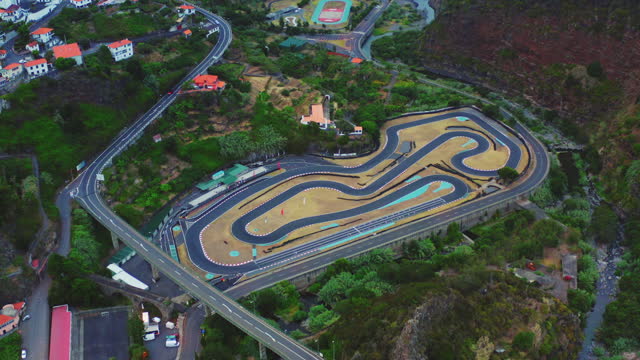 AERIAL Drone shot of Go-Cart Track and Bridge in Small Town, Madeira Island