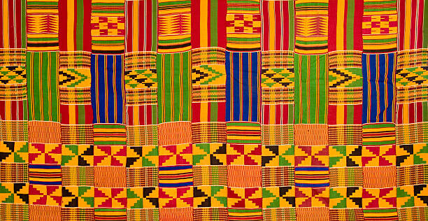 Ghana: Traditional Kente Cloth (detail of large-panel border) "Ghana: Traditional Kente Cloth (detail of large-panel border) of the Ashanti (or Asante) people, first developed in the 12th century.Kente Cloth is handwoven in narrow strips in traditional patterns on a four-harness loom, and handsewn into larger pieces as desired.  Each individual pattern rectangle is approximately 10 cm. x 16 cm.My other  photos of Ghana are in" ghana photos stock pictures, royalty-free photos & images