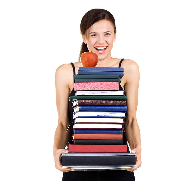 istock Young woman with books and apple 172349130