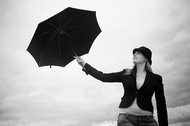 istock Woman with umbrella 172349616