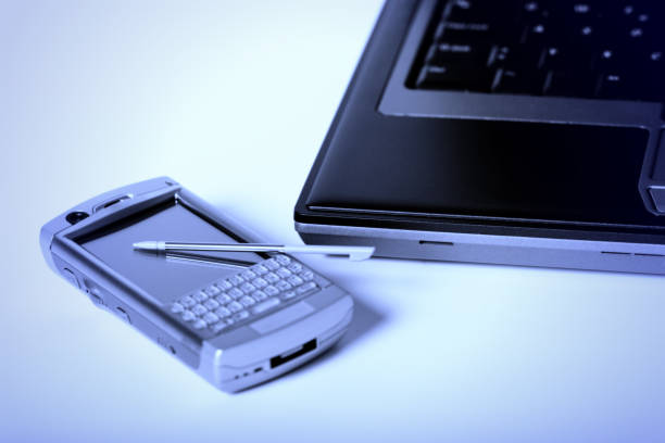 istock Laptop with PDA mobile phone 172349632