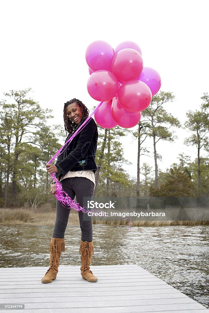 My Balloons Birthday girl with her pink balloons. 20-29 Years Stock Photo