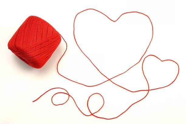 istock Red yarn or crochet string in the shape of hearts 172350963