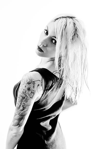 istock Sexy tattooed woman on white 172351968