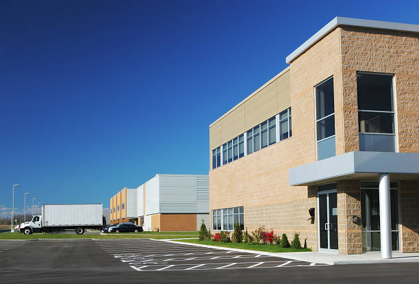 istock Modern Industrial Building with a delivery truck leaving 172351981