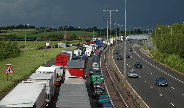 Traffic Jam, Stormy Day, M5 A traffic jam caused by an accident in stormy weather on a British motorway - M5. traffic car traffic jam uk stock pictures, royalty-free photos & images
