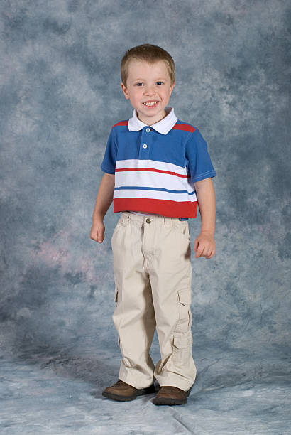 Boy Standing School Pose. "Shown here is a cute blue eyed, preschool age boy posing for his school picture.See other related images here:" school picture stock pictures, royalty-free photos & images