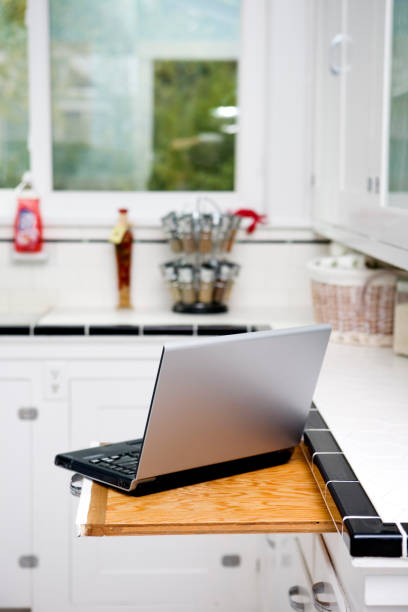 istock Bright White Domestic Kitchen with Laptop, Copy Space 172352763