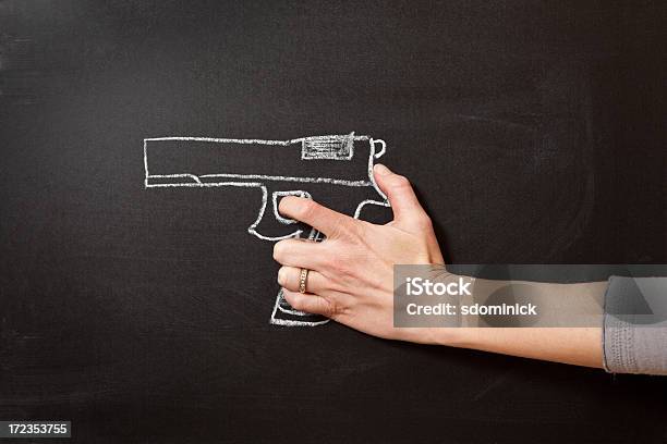 Hand Holding Chalk Drawn Gun Stock Photo - Download Image Now - Drawing - Activity, Gun, Adult