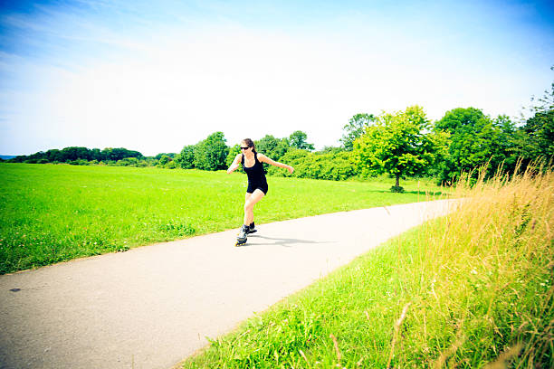 istock young woman with inline skates 172353812
