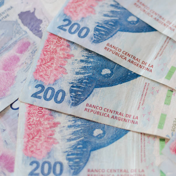 istock 200 Argentine peso bills, 1723538808