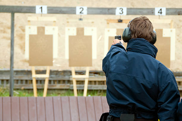 Target practicing with gun stock photo