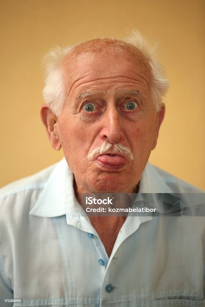 grandpa's tongue out garndpa's tongue out Disgust Stock Photo