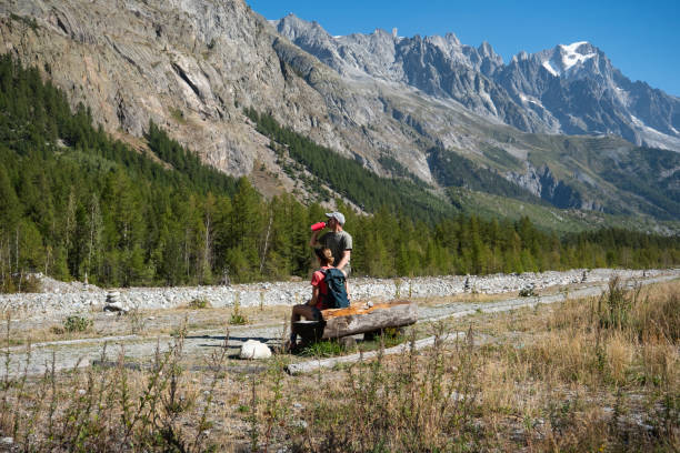 istock Active couple stop to drink some water while out hiking 1723556397
