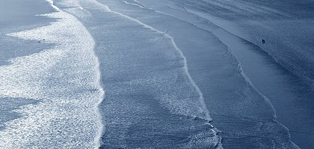 saunton sands - tide aerial view wave uk стоковые фото и изображения